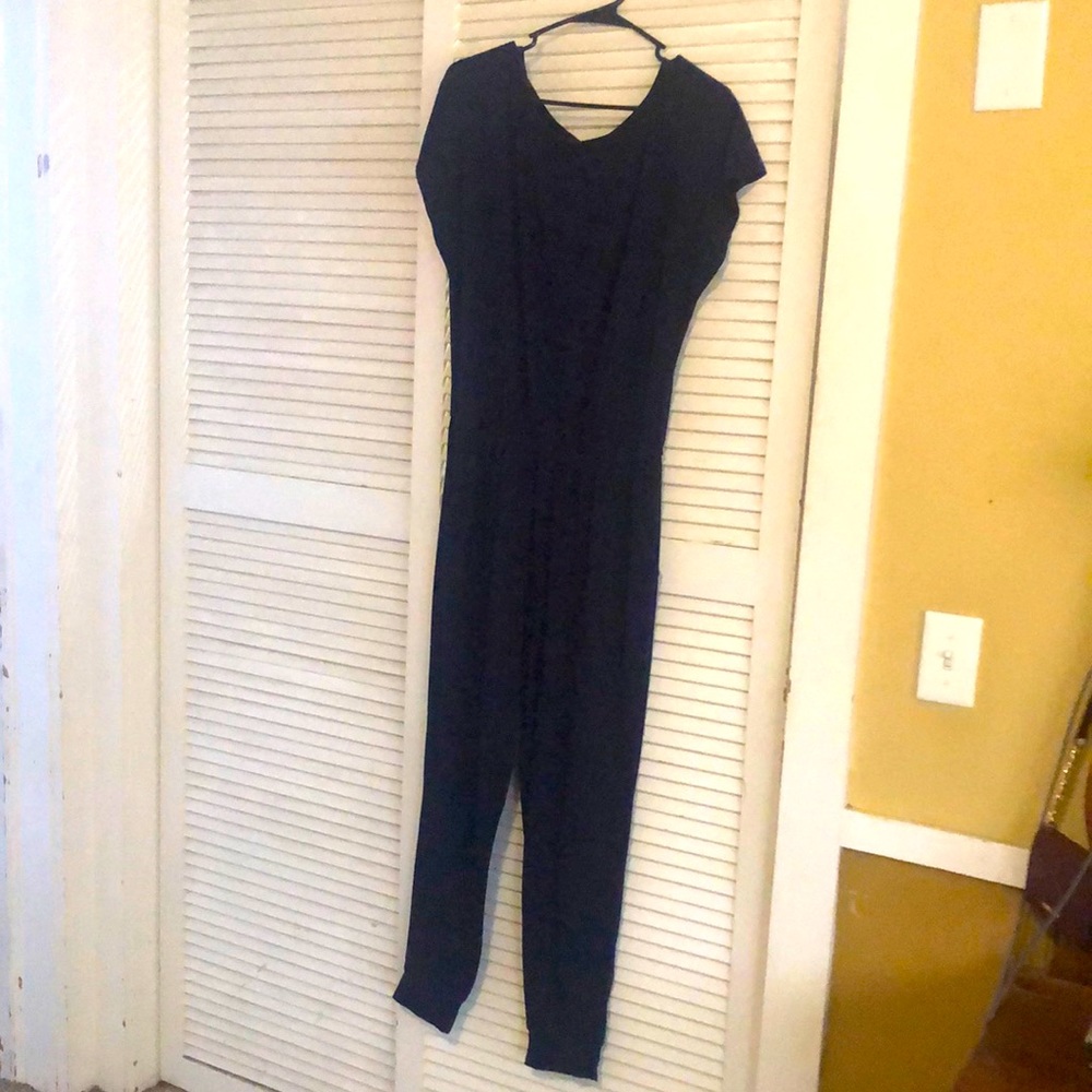 Large , far blue , pants romper. Worn a few times.
